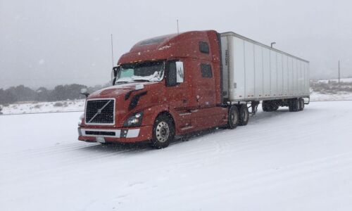 Red ABGL truck in the snow